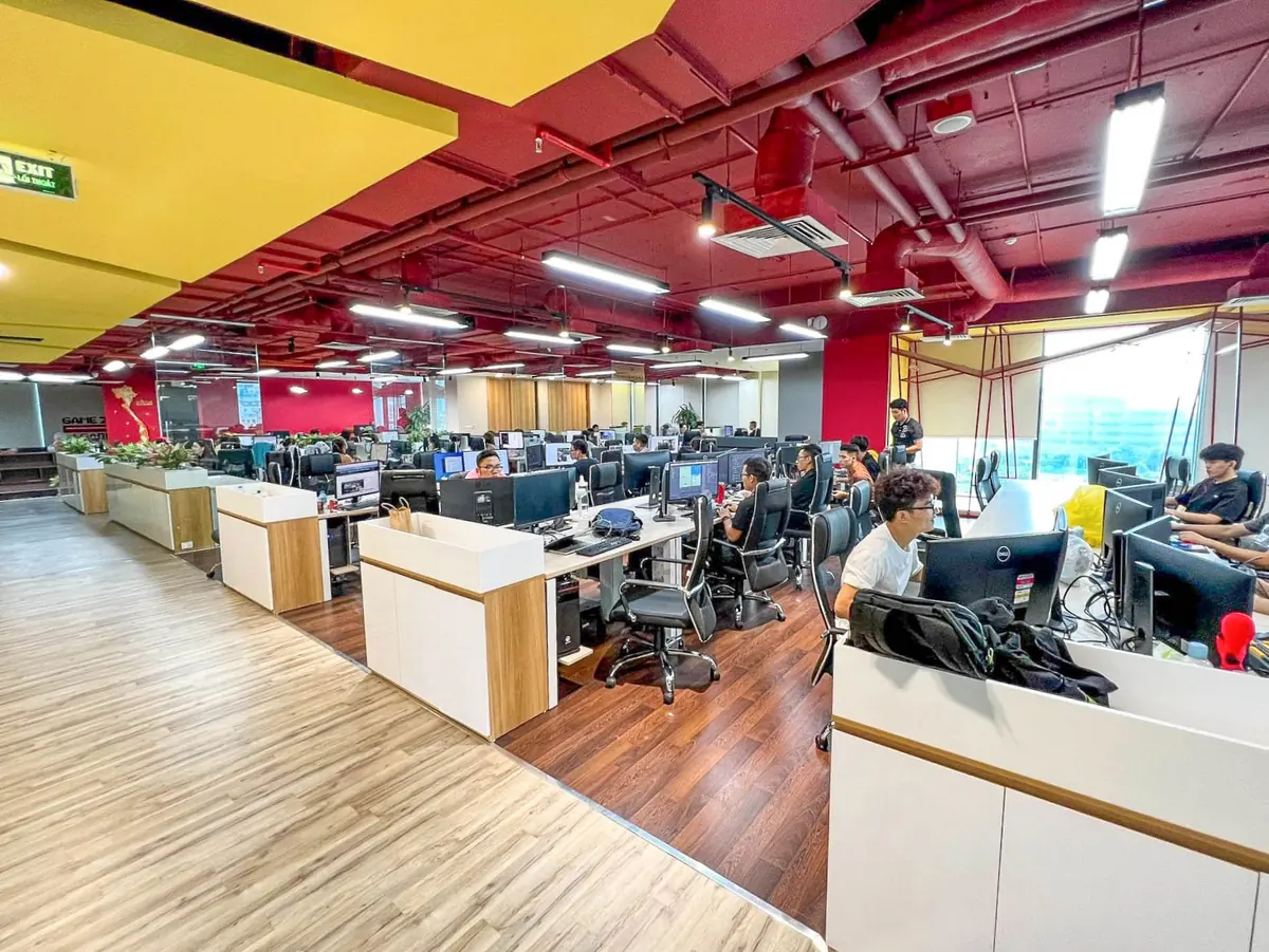 Teams at work in the AdTrue open-space office